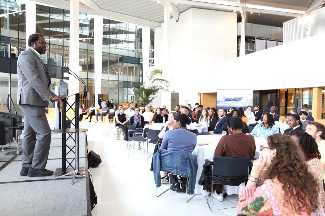 An audience listening to Ayo Akande